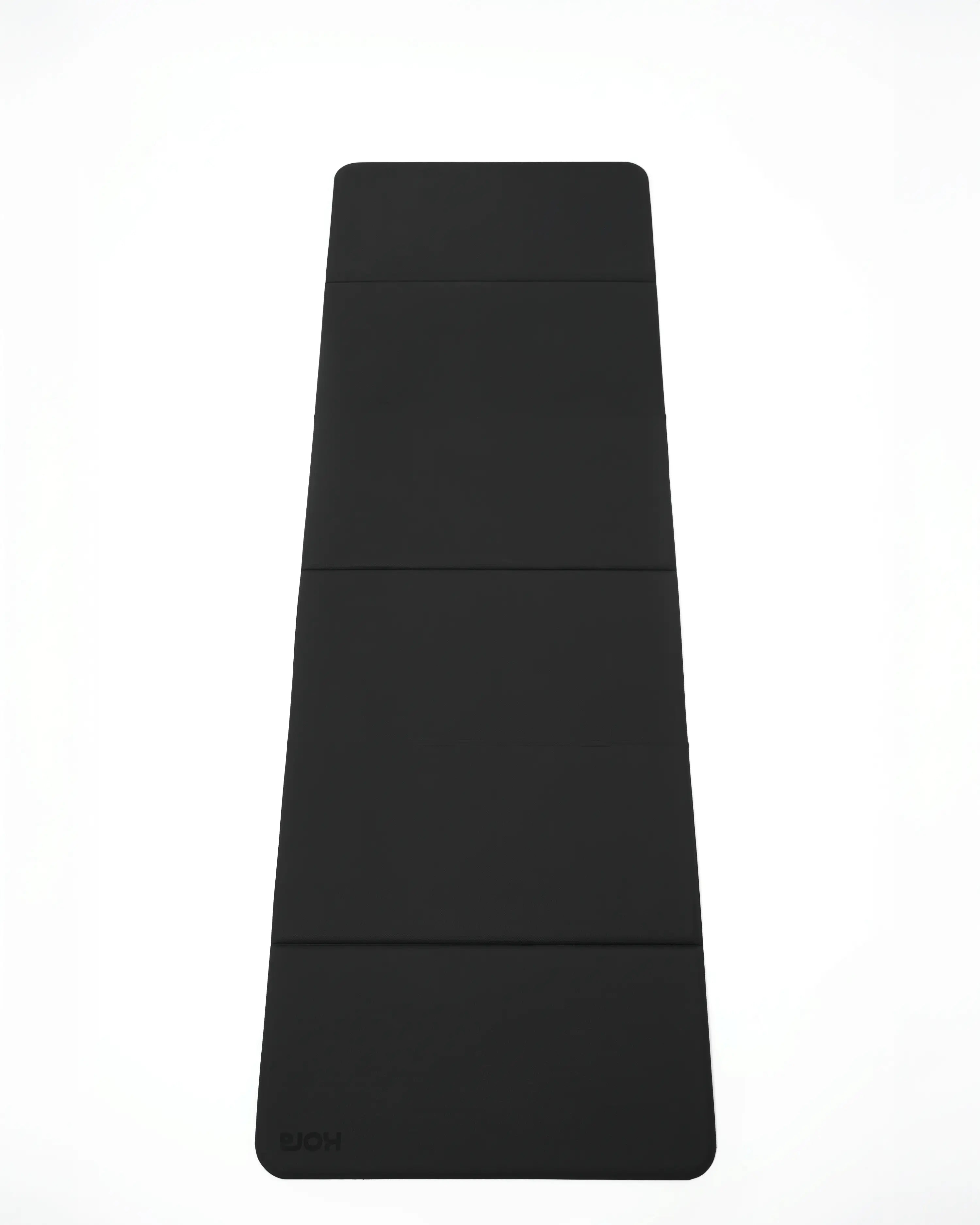 Black yoga mat on a white background