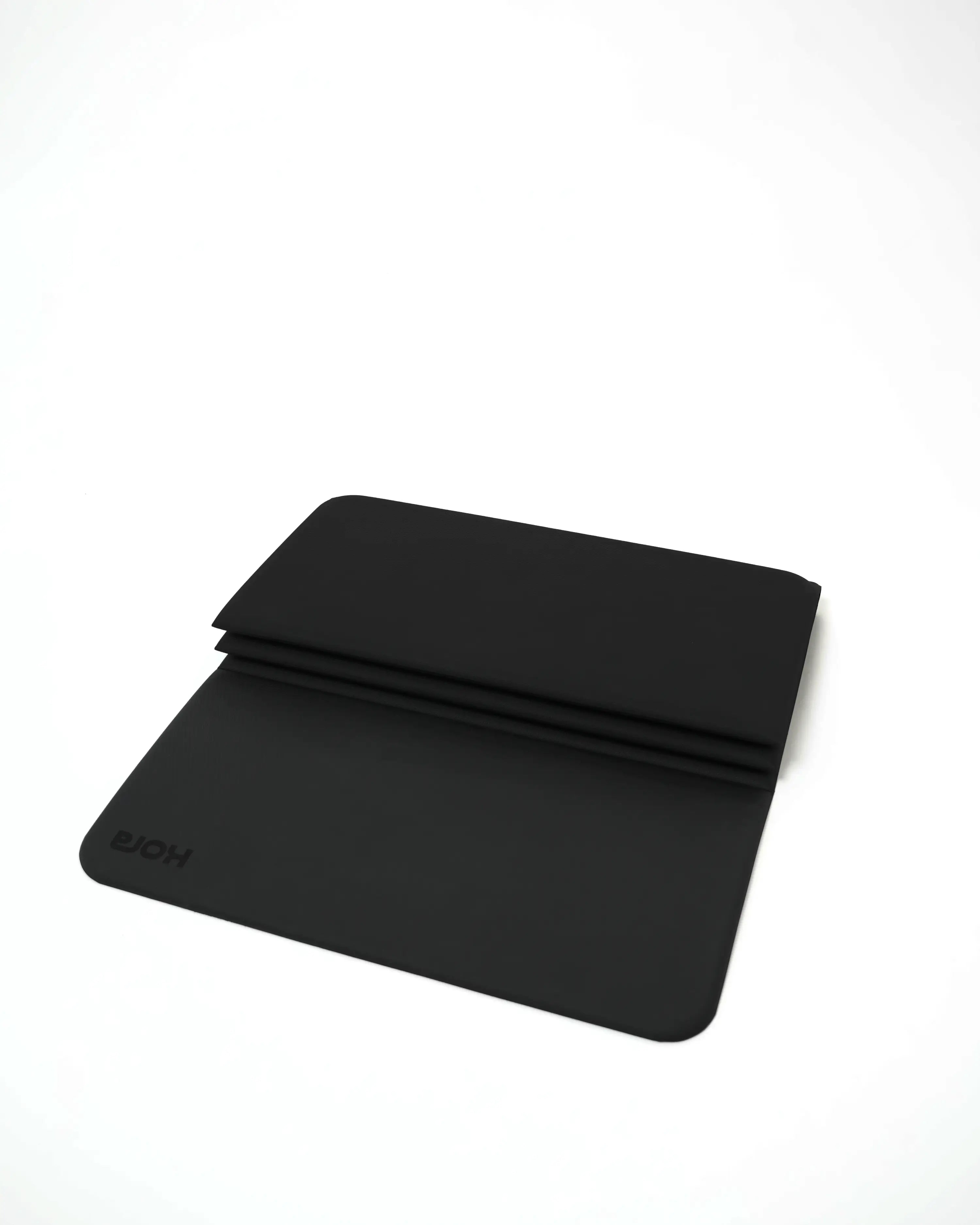 Black mouse pad with brand logo on a white background